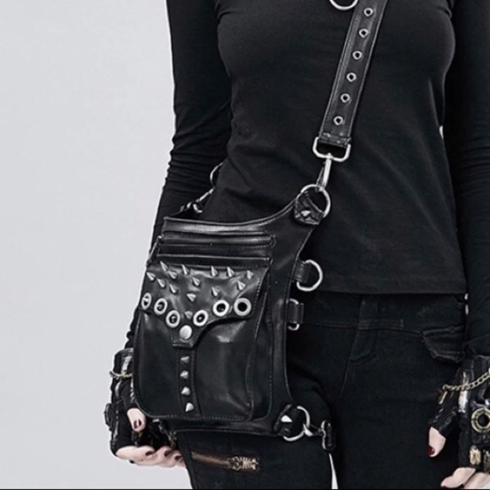 Sold NWOT faux leather black metal spikes holster